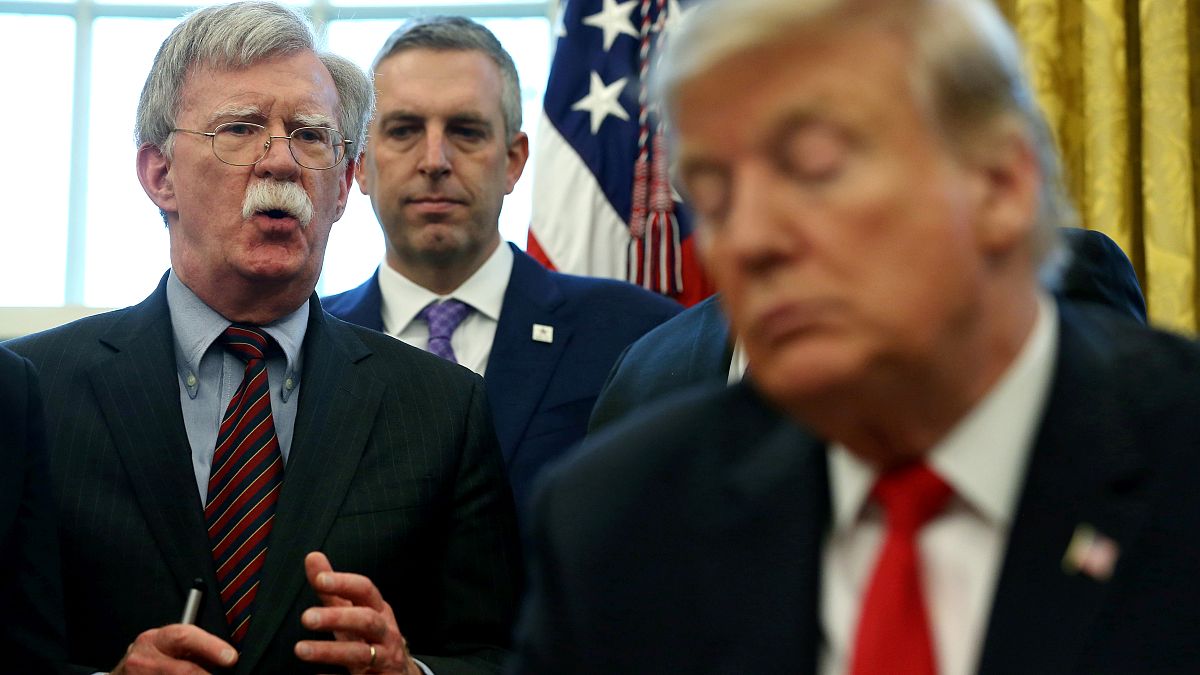 U.S. President Donald Trump and his national security advisor John Bolton (L) at the White House on  February 7, 2019.