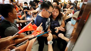 Pro and anti-Beijing groups scuffle in Hong Kong mall