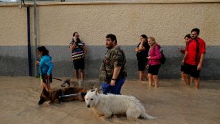 Emergency workers rescue baby amid severe flooding in southeastern Spain