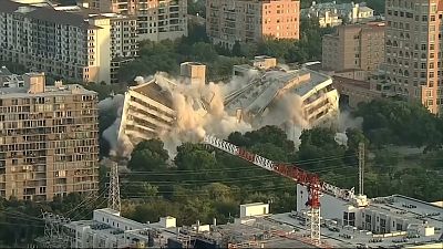 Drone footage shows bank building imploding in Dallas, Texas