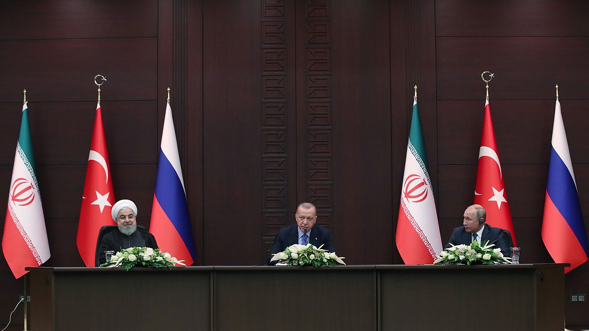 Cumhurbaşkanı Recep Tayyip Erdoğan, Rusya Devlet Başkanı Vladimir Putin ve İran Cumhurbaşkanı Hasan Ruhani Üçlü Zirve sonrası Çankaya Köşkü'nde basın toplantısı düzenledi