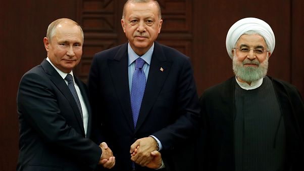 Iran, Russia and Turkey 'agree steps to de-escalate tensions' in Syria's Idlib Iran, Russia and Turkey 'agree steps to de-escalate tensions' in Syria's Idlib