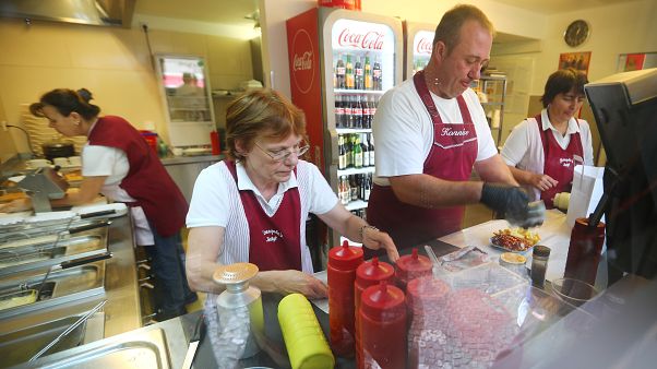 Trabajadores alemanes en el Día del Currywurst Trabajadores alemanes en el Día del Currywurst