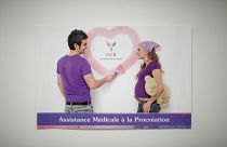 A poster promoting medical assistance for procreation is displayed in the lobby of the Laboratory of Reproductive Biology CECOS of Tenon Hospital in Paris, France