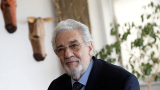 Opera singer Placido Domingo sits during an event at the Manhattan School of Music in New York