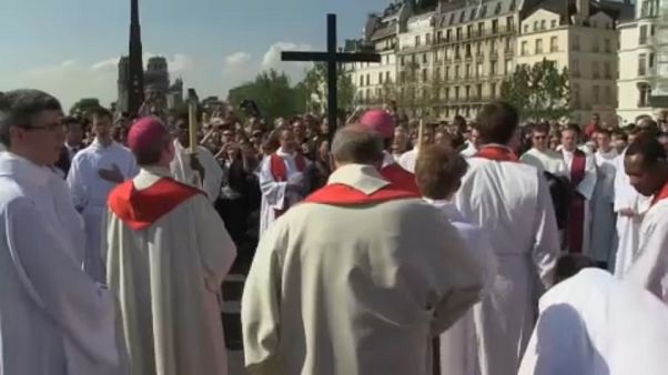 Emotional Notre-Dame cathedral Way of the Cross ceremony on Good Friday Emotional Notre-Dame cathedral Way of the Cross ceremony on Good Friday
