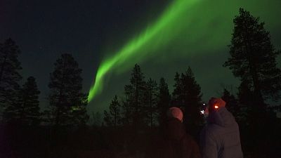 شفق قطبی در آسمان منطقه لاپلند در شمال فنلاند