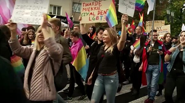 Polish police protect LGBT marchers as tensions rise before election Polish police protect LGBT marchers as tensions rise before election