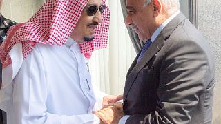 Prince Salman of Saudi Arabia, pictured here with the Iraqi prime minister (right)