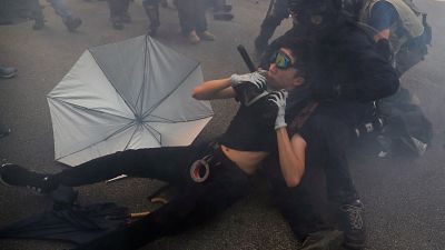 Police use tear gas at anti-China protest in Hong Kong