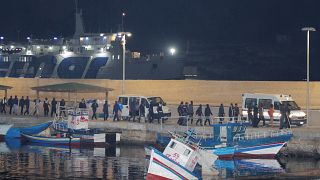مهاجرون في ميناء لامبيدوسا إيطاليا
