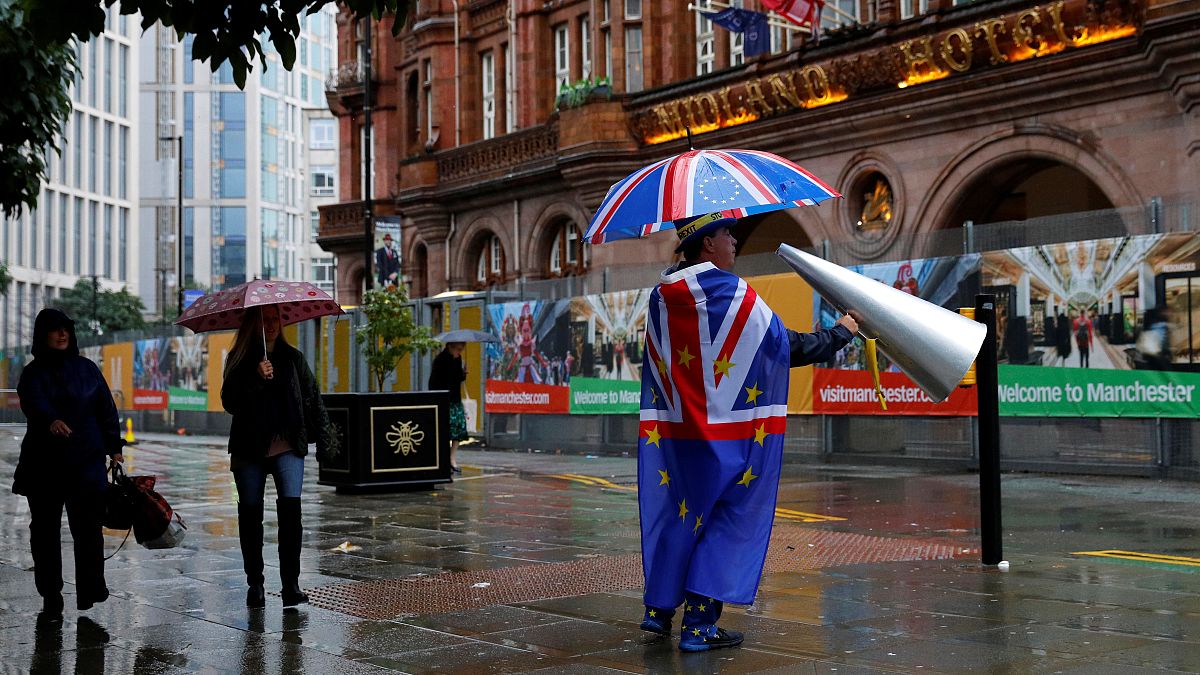 A Brexit protester outside the Conservative Party conference in Manchester, England 