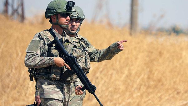 ABD ile yürütülen ortak kara devriyesi kapsamında Tel Abyad yakınlarında görev yapan Türk askerleri ABD ile yürütülen ortak kara devriyesi kapsamında Tel Abyad yakınlarında görev yapan Türk askerleri
