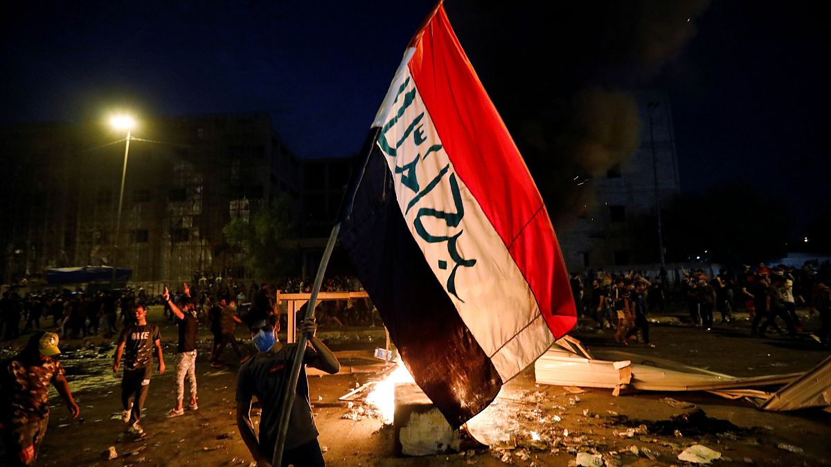 Demonstrators gather at a protest during a curfew, two days after the nationwide anti-government protests turned violent, in Baghdad, Iraq October 3, 2019. 