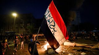 Demonstrators gather at a protest during a curfew, two days after the nationwide anti-government protests turned violent, in Baghdad, Iraq October 3, 2019. 