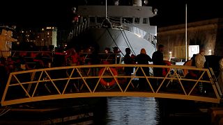 Rescued migrants disembark from an Armed Forces of Malta patrol boat in Valletta's Marsamxett Harbour, Malta September 30, 2019