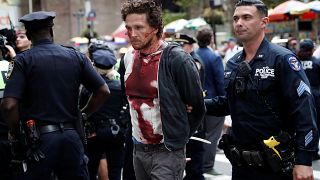 'Bloodied protesters' stage climate demonstration in New York City