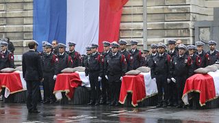 الرئيس الفرنسي إيمانويل ماكرون خلال مراسم تأبين أربعة ضباط شرطة فرنسيين قتلوا في باريس. أكتوبر 2019