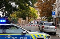 Police secure the area after a shooting in the eastern German city of Halle
