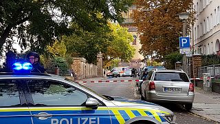 Police secure the area after a shooting in the eastern German city of Halle