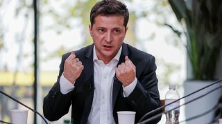 Ukraine's President Volodymyr Zelenskiy holds a press-marathon at a food market in Kiev, Ukraine October 10, 2019.