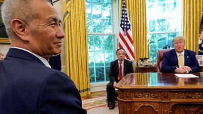 Estados Unidos y China alcanzan un "amoroso" acuerdo comercial parcial