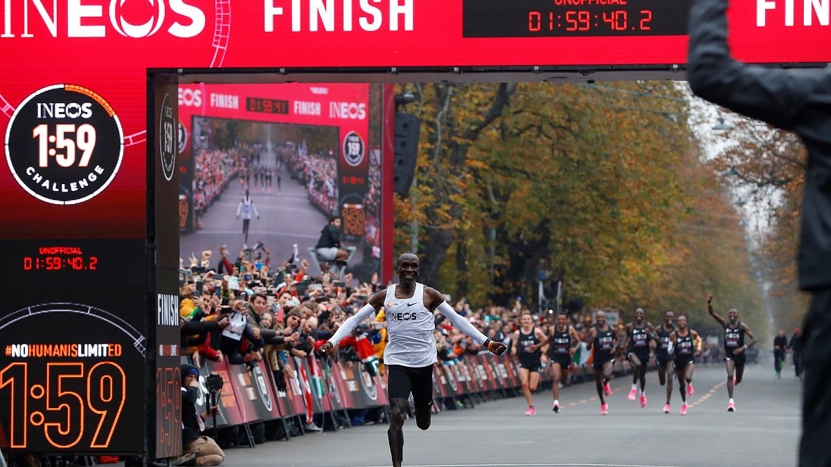 enya's Eliud Kipchoge, the marathon world record holder, crosses the finish line during his attempt to run a marathon in under two hours in Vienna, Austria, October 12, 2019.