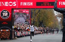 enya's Eliud Kipchoge, the marathon world record holder, crosses the finish line during his attempt to run a marathon in under two hours in Vienna, Austria, October 12, 2019.