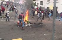 Rocks and tear gas as protesters clash with riot police in Ecuador