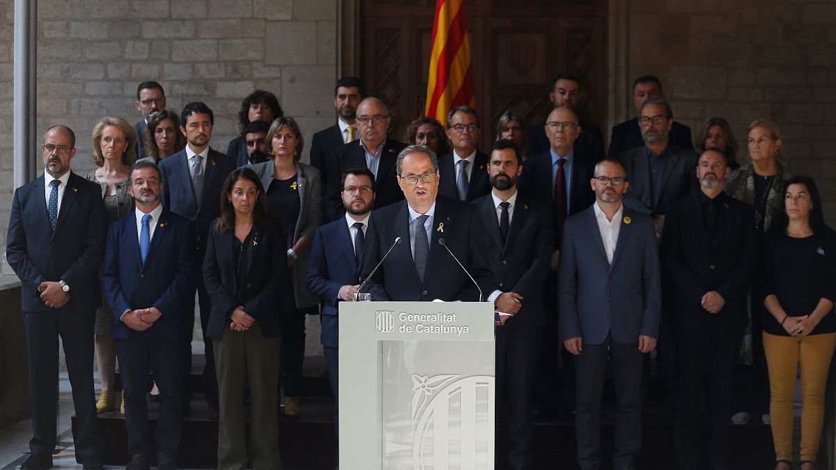 Catalunya's President Quim Torra, accompanied of Parliament President Roger Torrent, delivers a statement at the Catalan regional Parliament in Barcelona, Spain.
