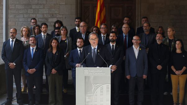 Catalunya's President Quim Torra, accompanied of Parliament President Roger Torrent, delivers a statement at the Catalan regional Parliament in Barcelona, Spain. Catalunya's President Quim Torra, accompanied of Parliament President Roger Torrent, delivers a statement at the Catalan regional Parliament in Barcelona, Spain.