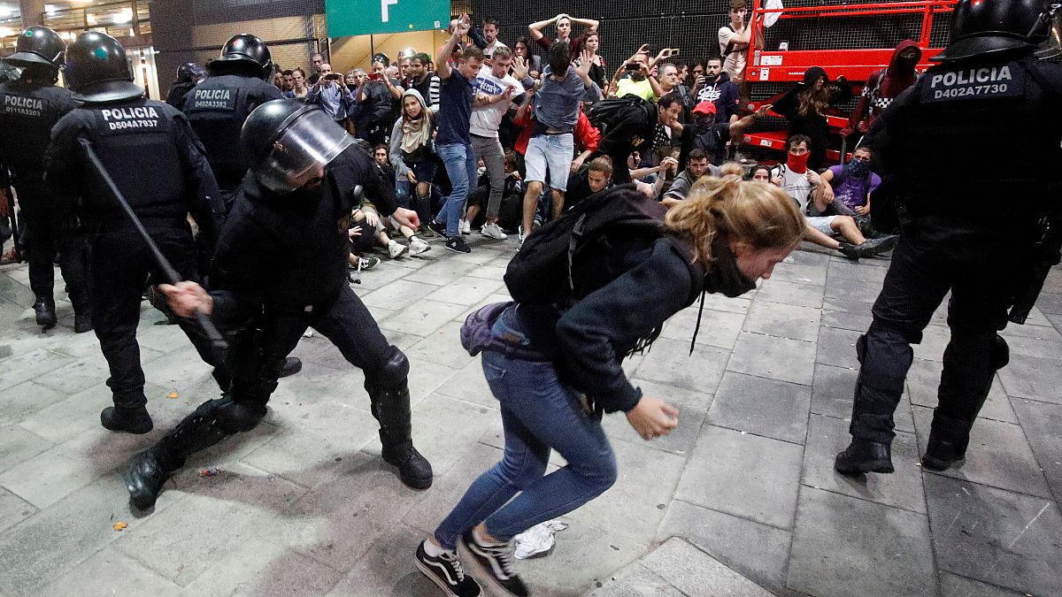 Flights cancelled as pro-separatist protesters clash with police at Barcelona airport