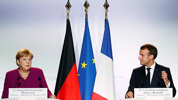 Le président français Emmanuel Macron et la chancelière allemande Angela Merkel, le 16 octobre 2019 à Toulouse Le président français Emmanuel Macron et la chancelière allemande Angela Merkel, le 16 octobre 2019 à Toulouse