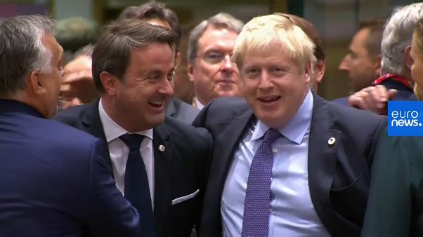 Watch: Hearty handshakes as Boris Johnson toasts Brexit deal with EU leaders Watch: Hearty handshakes as Boris Johnson toasts Brexit deal with EU leaders