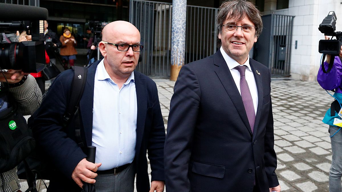 Former Catalan leader Carles Puigdemont walks free after handing himself to Brussels police