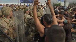 Angry protesters block major roads in Lebanon