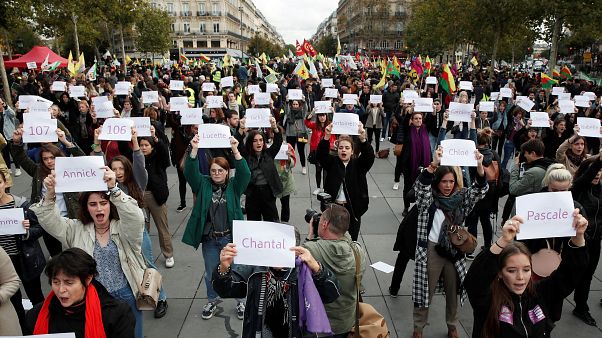 People attend a demonstration against femicide and violence against women at Place de la Republique in Paris People attend a demonstration against femicide and violence against women at Place de la Republique in Paris