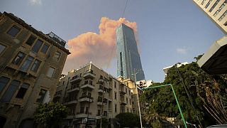 A cloud from a massive explosion is seen in in Beirut, Lebanon, Tuesday, Aug. 4, 2020
