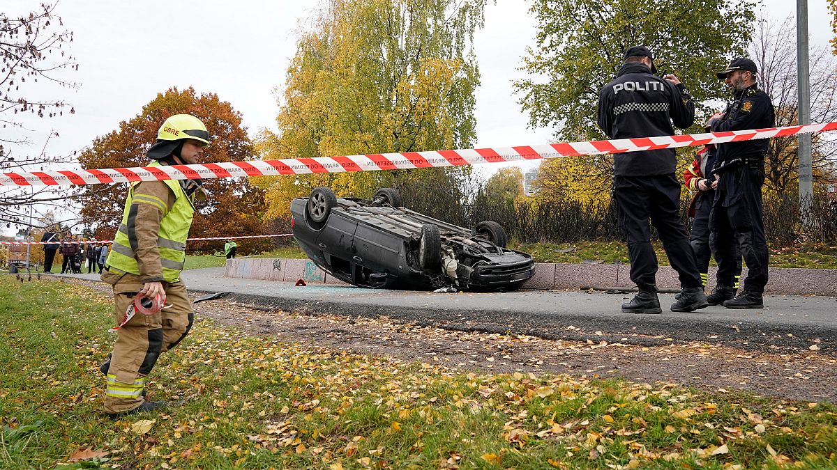 An overturn car is seen on the road, after it was allegedly struck by an ambulance which was stolen by an armed man in Oslo, Norway, October 22, 2019.