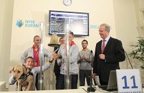 FILE PHOTO: Belgian athlete Marieke Vervoort rings a bell in the presence of fellow athletes, 2012s