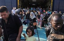 GREEK AUTHORITIES MOVE MIGRANTS TO MAINLAND 