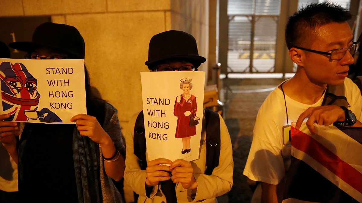 Activists form human chain at UK consulate in Hong Kong
