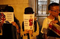 Activists form human chain at UK consulate in Hong Kong