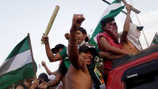 Demonstrators take part in a protest against Bolivia's President and current candidate Evo Morales in Santa Cruz de la Sierra, Bolivia, October 24, 2019. 