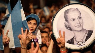 Supporters of Peronist candidate Alberto Fernandez celebrate his victory in Argentina