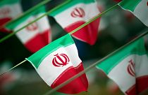 أعلام إيران- أرشيف رويترز