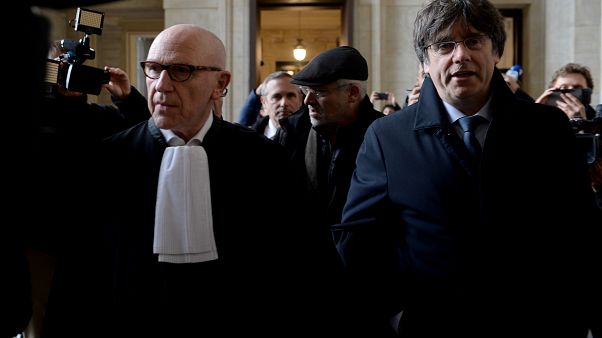 Former Catalan leader Carles Puigdemont arrives at court for his warrant case Former Catalan leader Carles Puigdemont arrives at court for his warrant case