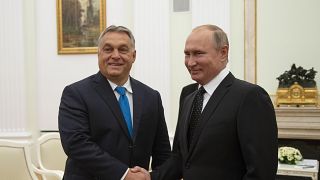 FILE PHOTO: Hungarian Prime Minister Viktor Orban (L) shakes hands with Russian President Vladimir Putin during their meeting in the Kremlin in Moscow, on September 18, 2018.