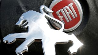 Peugeot et Fiat Chrysler officialisent leur projet de fusion 