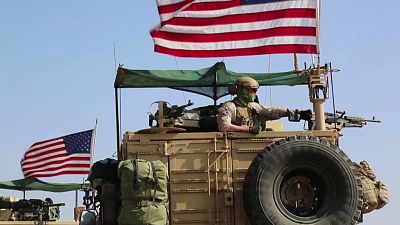 Vehicles flying US flags seen near Syria-Turkey border